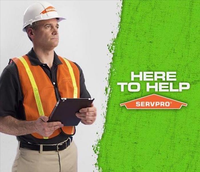 Here to Help - SERVPRO logo and technician